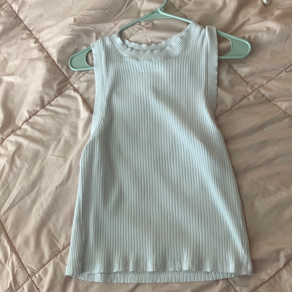 White sleeveless top
